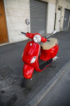 Red Italian scooter.