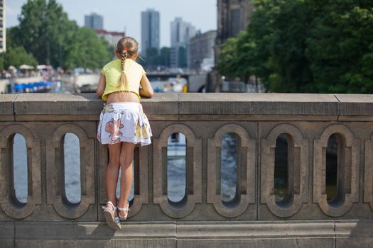 Tourists. Beautiful girl walking in berlin city.