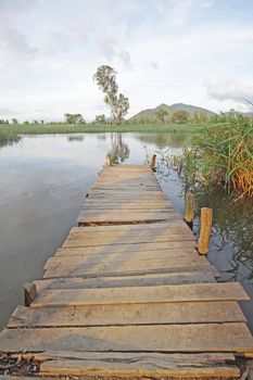 Jetty on lake at day