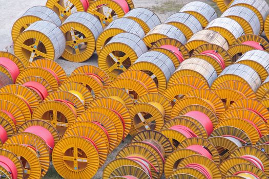 electricity cable on wooden spools 