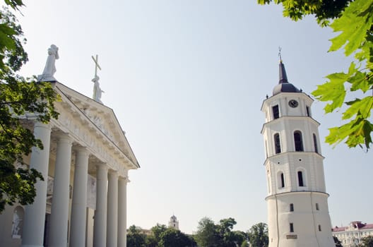 Religious Cathedral fragment with large colums and bell tower. Lithuania Vilnius.