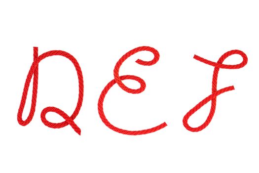 Red fiber rope bent in the form of letter D,E,F