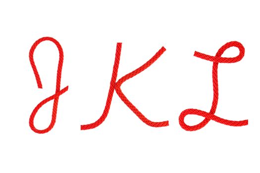 Red fiber rope bent in the form of letter J,K,L