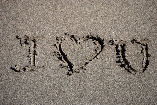 I Love You Text Written on the Sand