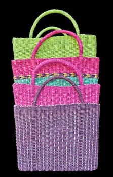 Colour of four woven baskets isolated on black