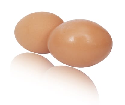 two brown eggs isolated on white background 