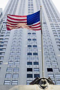 American flag in front of a building.