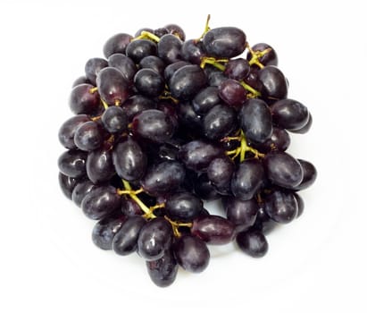 Bunch of black grapes isolated on white background 