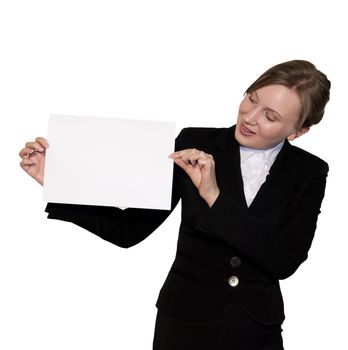 Business women shows a white sheet of paper, isolated on white
