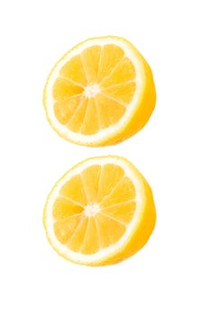 fresh lemon halves on white background
