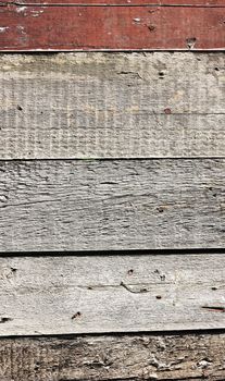 Close up of gray wooden fence panels 