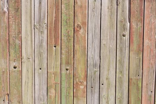 Close up of gray wooden fence panels 