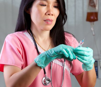 Attractive Female Asian with syringe