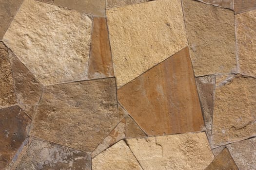 Unshaped stone wall pattern,wall made of rocks 