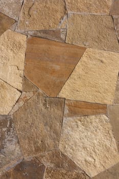 Unshaped stone wall pattern,wall made of rocks 