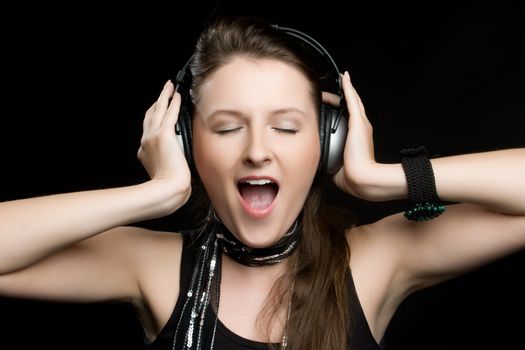 Beautiful woman singing headphones music