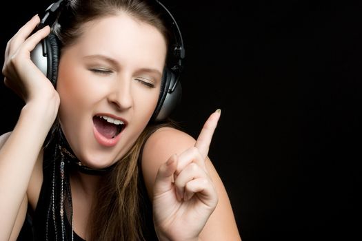 Singing happy headphones music girl