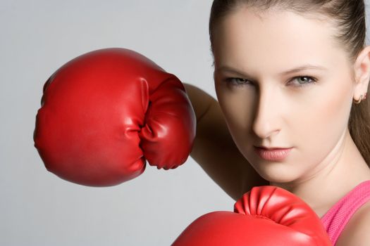Beautiful aggressive female boxer woman