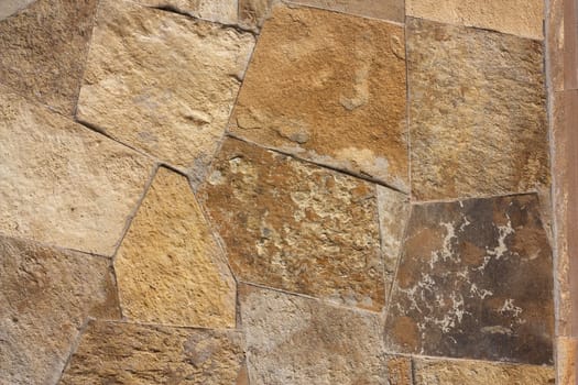 Unshaped stone wall pattern,wall made of rocks 