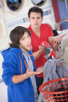 Latino and Caucasian men can't explain clothing switch in laundromat