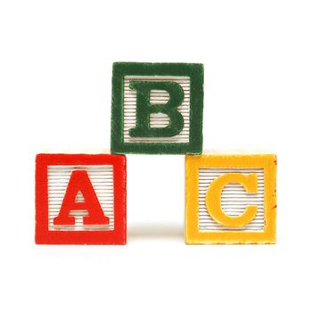 Three alphabet blocks for the young mind to learn the english language.