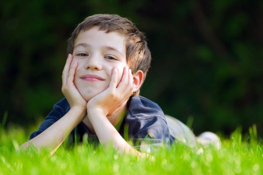 Cute young child in meadow