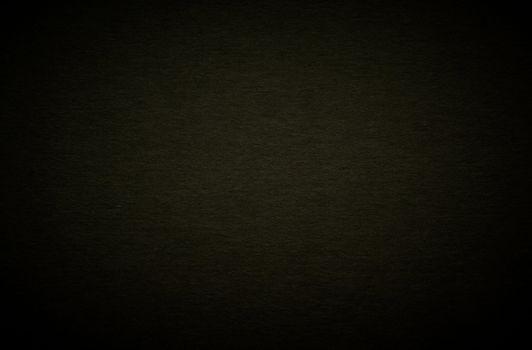 A black design cardboard texture background.