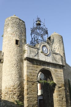 old door of Camaret-sur-Aigues city in Provence, France