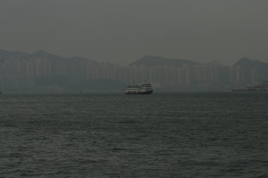 Ship against the Hong Kong skyline as seen from the Star Avenue