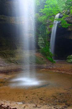 Twin waterfalls crash into Tonti Canyon on a spring day at Starved Rock State Park.