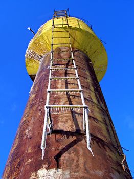 stairway in ice on water tower