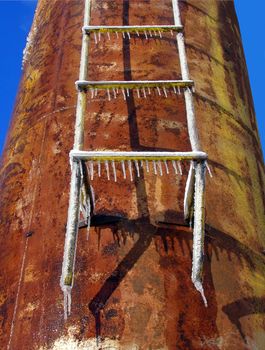 stairway in ice on water tower