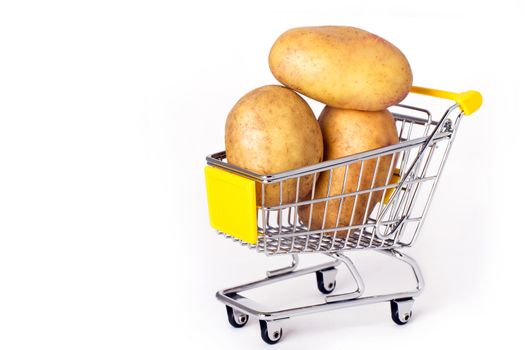 Shopping cart with three large potatoes