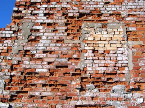 destroyed brick wall