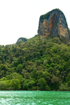 High cliffs on the tropical island. Exotic tropical landscape.