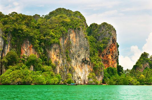 High cliffs on the tropical island. Exotic tropical landscape.