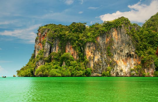 High cliffs on the tropical island. Exotic tropical landscape.