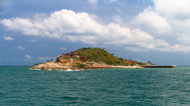 High cliffs on the tropical island. Exotic tropical landscape.