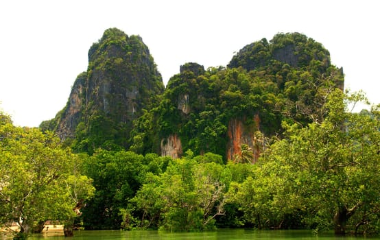 High cliffs on the tropical island. Exotic tropical landscape.