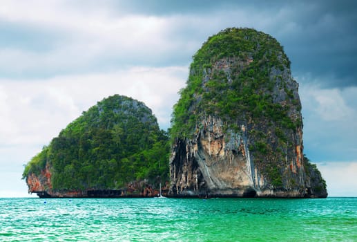 High cliffs on the tropical island. Exotic tropical landscape.