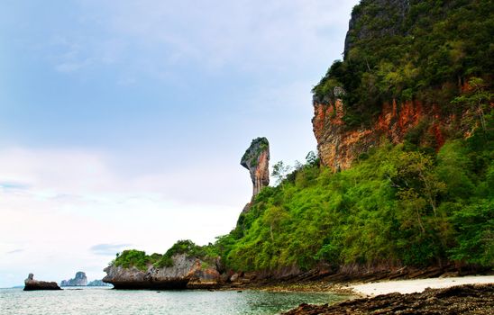 High cliffs on the tropical island. Exotic tropical landscape.