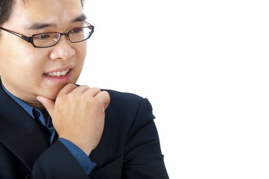 Close-up of a Asian businessman thinking.