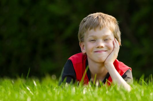 Cute young child in meadow