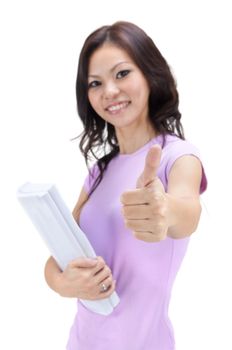 Female student thumbs up with great smile.