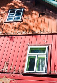 Front of a large wooden house in northern Moravia