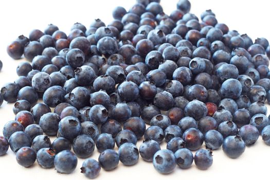 Bunch of fresh blueberries on white background