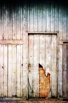 An old and damaged wood door