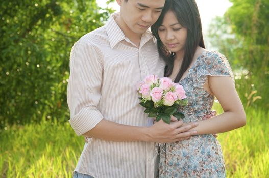 Loving Asian Couple at outdoor