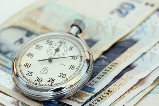 Chronometer and Bulgarian currency close up, shallow dof
