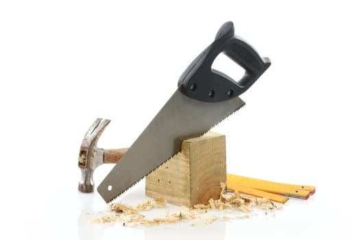 carpenter's tools close up over white background